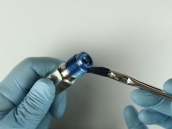 Reapply Blue Goop to the top threads and to the top of the adapter.