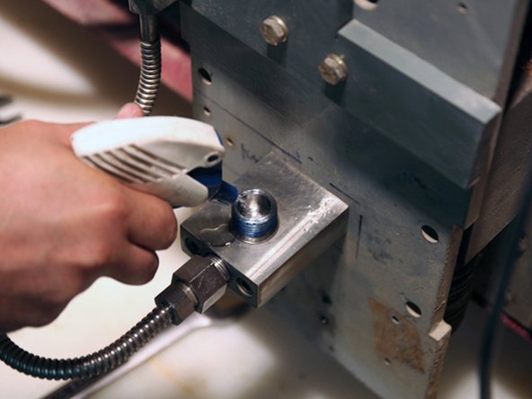 Visually inspect top and bottom of valve bore for cracks or blemishes.