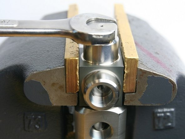 Tighten the thrust nut into the swivel housing with a 5/8&quot; wrench.