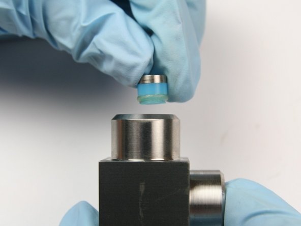 Put the second high-pressure seal assembly into the swivel housing with the O-ring first.