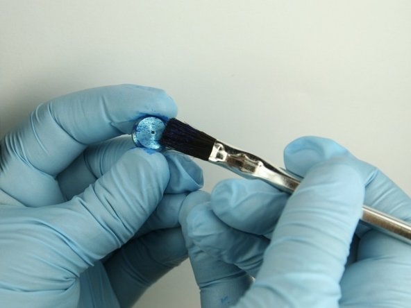 Apply Blue Goop to all surfaces of the poppet seat.