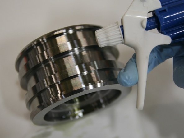 Reapply the hydraulic fluid to the  piston with a spray bottle.