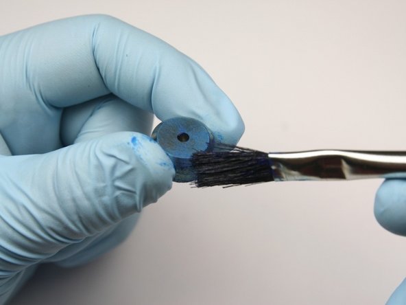 Apply a layer of Blue Goop to the side and one face of the high-pressure seat.