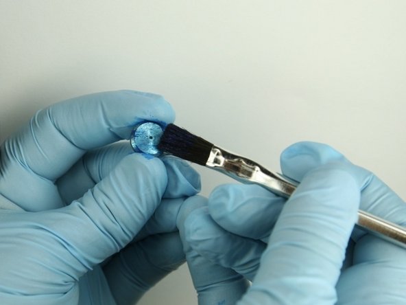 Apply Blue Goop to all surfaces of the high-pressure seat.