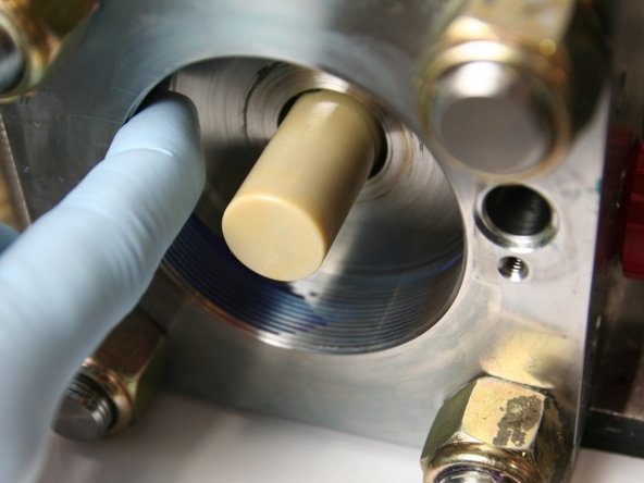 Apply Blue Goop to the threads on both ends of the cylinder and to the threads on the end cap.