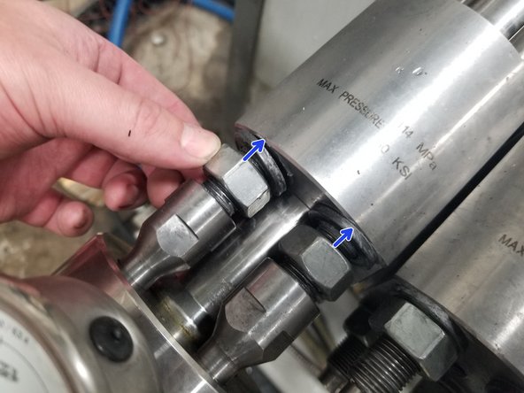 Slide End Cap onto tie rods and align with HP Cylinder