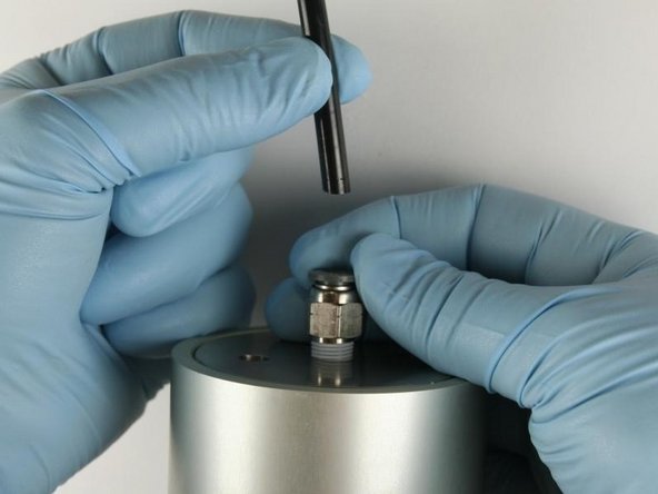 Disconnect the air line from the actuator.