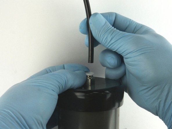 Disconnect the air line from the actuator.