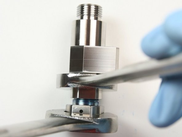 Using a 1&quot; wrench on outlet adapter and a 7/8&quot; wrench on the valve body, tighten securely