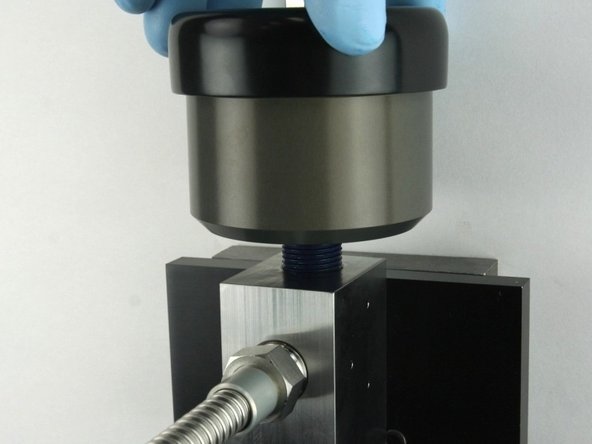 Thread (hand tighten) the actuator into the top of the valve body until it bottoms out.