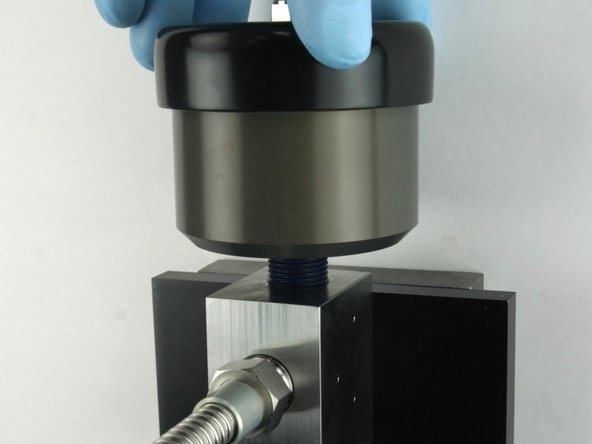 Thread (hand tighten) the actuator into the top of the valve body until it bottoms out.