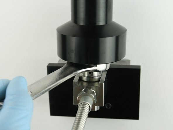 Unthread the actuator from the valve body using 1-1/8&quot; wrench.