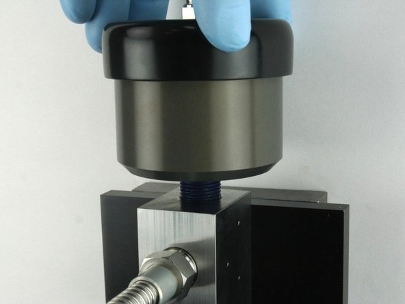 Thread (hand tighten) the actuator into the top of the valve body until it bottoms out.