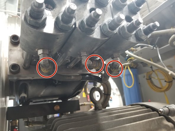 Remove inlet water hoses from the bottom of the end cap