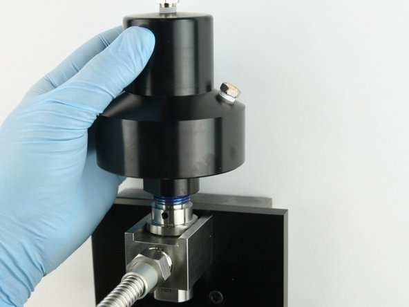 Thread (hand tighten) the actuator to the top of the valve body.