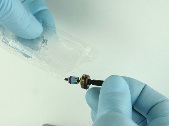 Apply high-pressure lubricant to the outside diameter of the high-pressure valve seal.