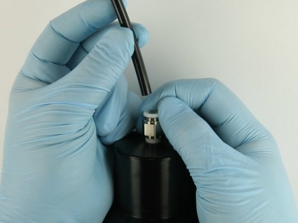 Disconnect the air line from the actuator.