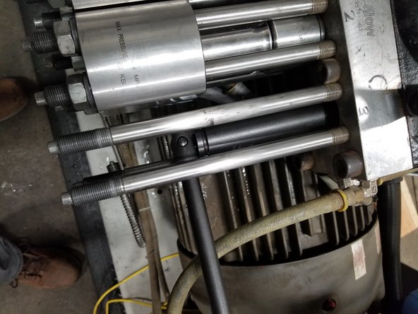 Replace with new plunger and spring. Torque plunger nut to 20 ft-lb (27 N-m).Be careful not to contact the plunger