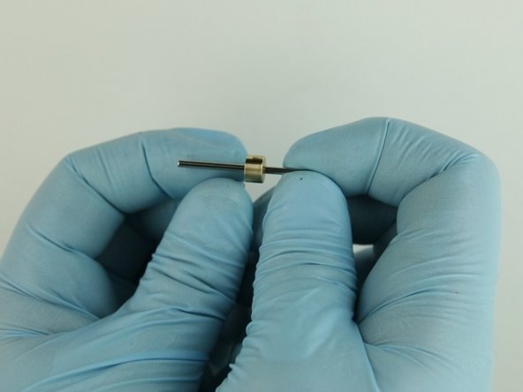 Put the bushing stem onto the poppet stem.