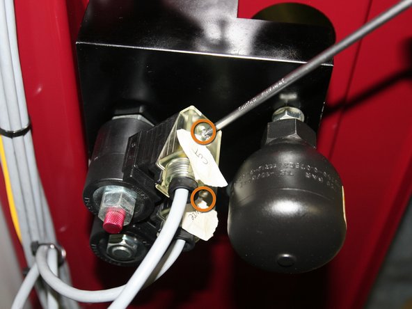 Remove DIN connectors from solenoids on back of old control manifold.