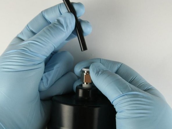 Disconnect the air line from the actuator.