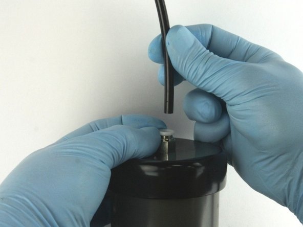 Disconnect the air line from the actuator.