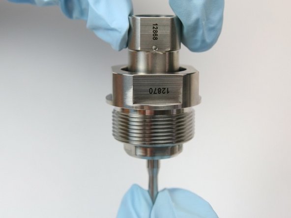 Thread swivel nut onto swivel shaft