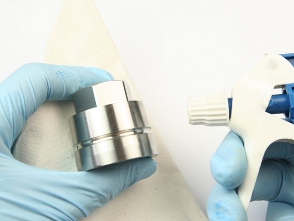 Use a .450" gauge pin to press the swivel bearing out of the bearing half of the swivel housing.