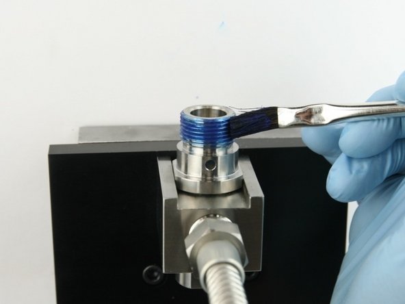 Apply Blue Goop to the top threads of the valve body.