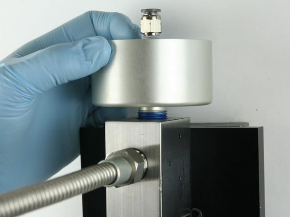 Unthread the actuator from the valve body.