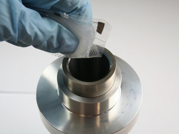 Apply a high vacuum grease to the ID of the sleeve.