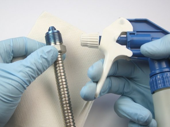 Clean the high-pressure gland of all Blue Goop.