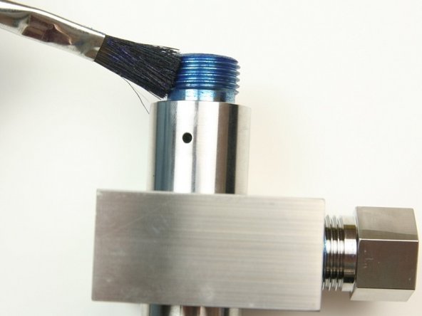 Apply Blue Goop to the top threads of the valve body.