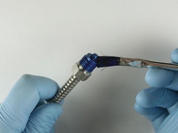 Reapply Blue Goop to the high-pressure tubing threads and cone.