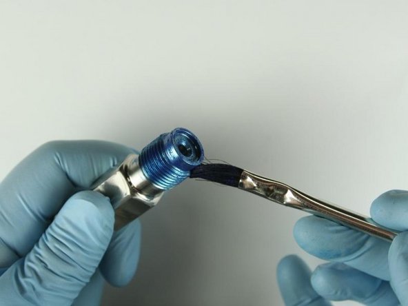 Re-apply Blue Goop to the top threads and to the top of the adapter.