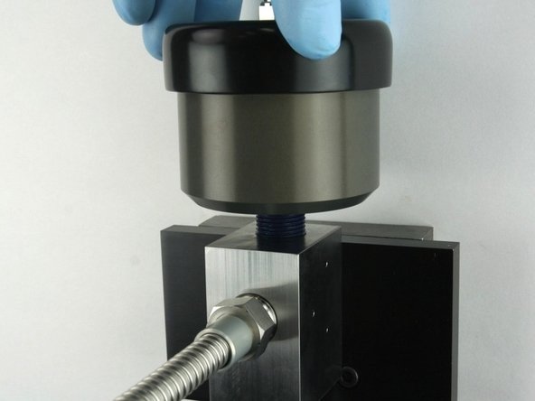 Thread (hand tighten) the actuator into the top of the valve body until it bottoms out.