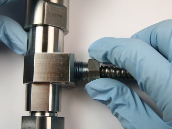 Thread the 1/4&quot; gland nut into the side of the bleed down valve body.