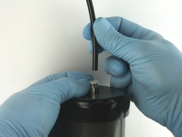 Disconnect the air line from the actuator.