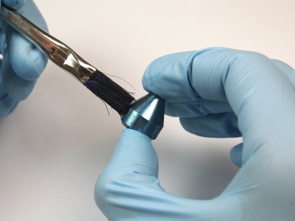 Apply Blue Goop to all surfaces of the high-pressure seat.