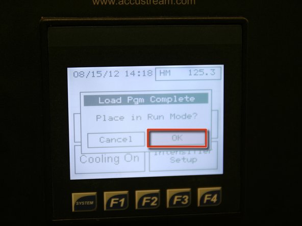 After program has loaded, press OK to place pump in run mode.
