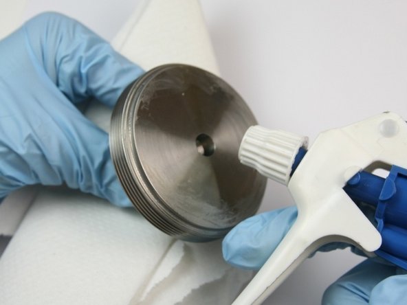 Clean the actuator cap of all lithium grease.