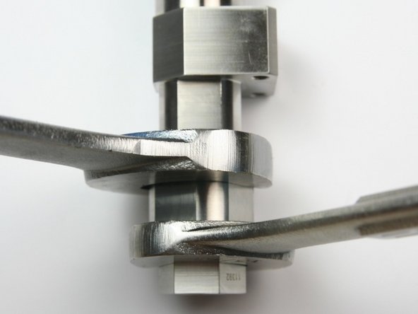 Loosen 3/8&quot; to 1/4&quot; adapter from bleed down valve outlet adapter using 1&quot; and 13/16&quot; wrench