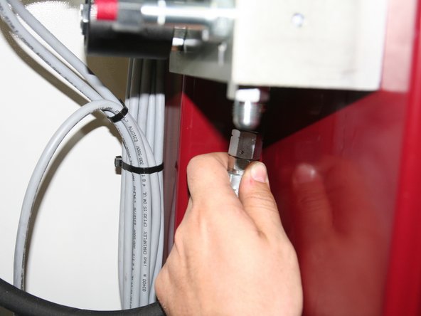 Connect short hydraulic line from &quot;T&quot; fitting near tank to port labeled T on bottom of new manifold.