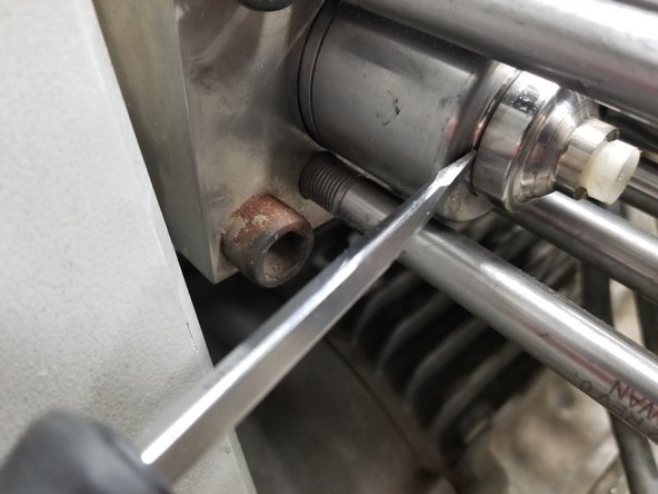 Use a screwdriver to remove seal carrier, if necessary