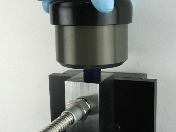 Unthread the actuator from the valve body.