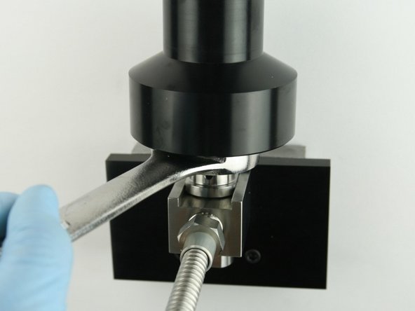 Unthread the actuator from the valve body using 1-1/8&quot; wrench.