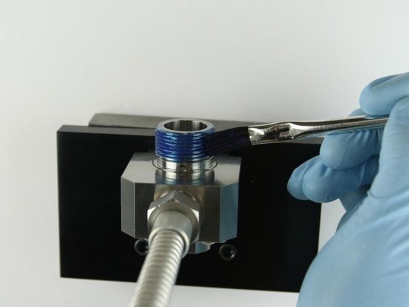 Apply Blue Goop to the top threads of the valve body.