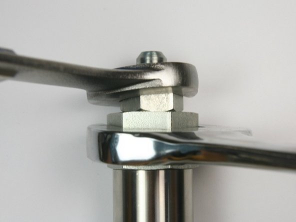 Tighten the hydraulic fitting into the hydraulic adapter.