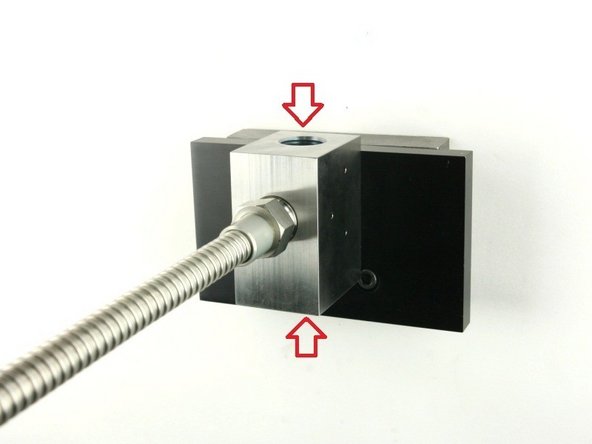 Visually inspect the top and bottom of the valve bore for cracks/blemishes. If excessive wear or cracks are visible, replace the valve body.