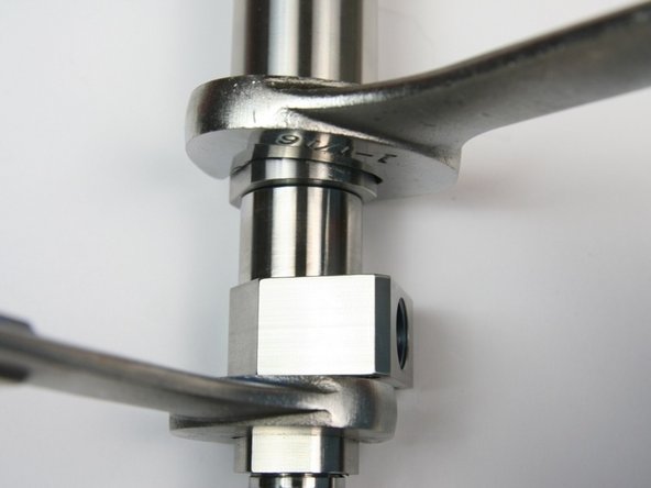 Tighten the actuator housing to the valve body using a 1-1/16&quot; and 7/8&quot; wrench.